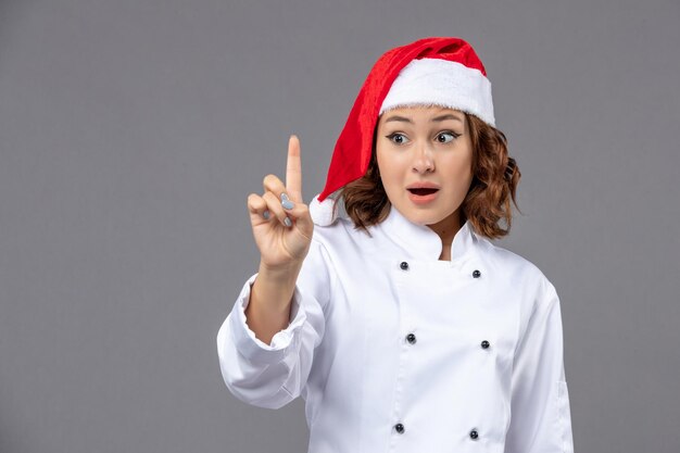 Expressive young cook posing for winter holidays