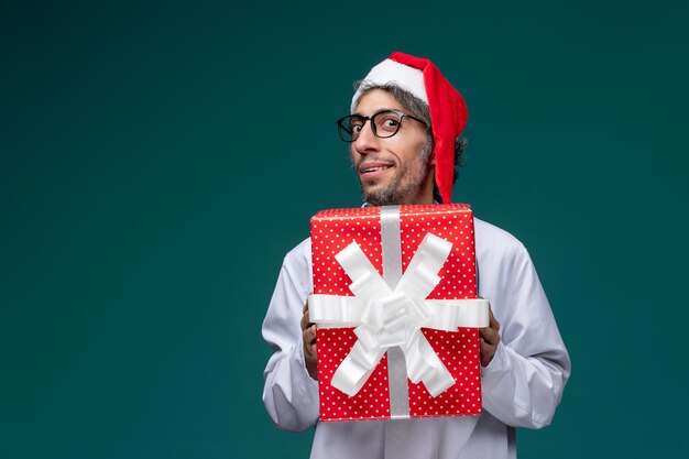 Expressive young doctor posing for winter holidays