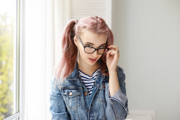 Expressive young girl posing indoor