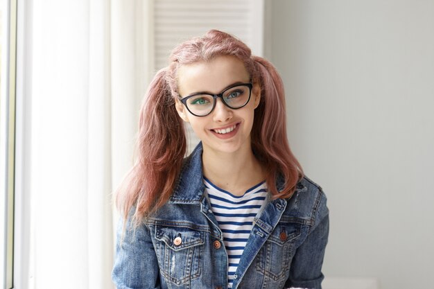 Expressive young girl posing indoor