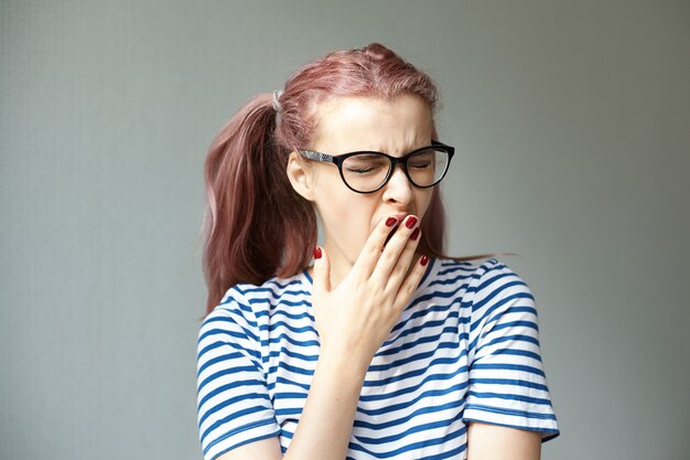 Expressive young girl posing indoor