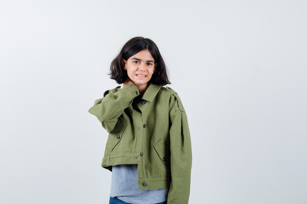 Expressive young girl posing in the studio