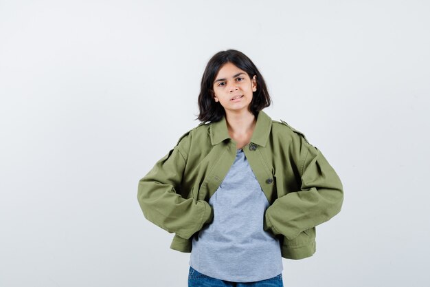 Expressive young girl posing in the studio