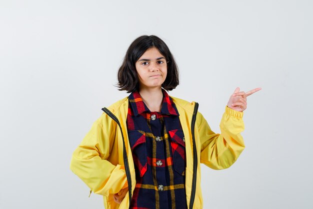 Expressive young girl posing in the studio