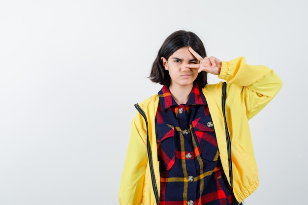 Expressive young girl posing in the studio