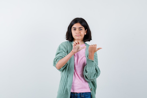 Expressive young girl posing in the studio