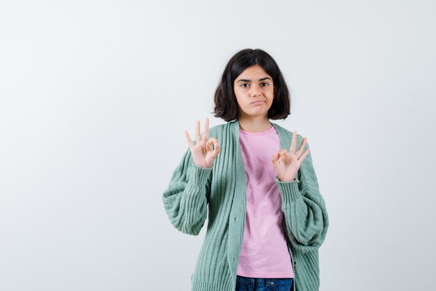 Expressive young girl posing in the studio