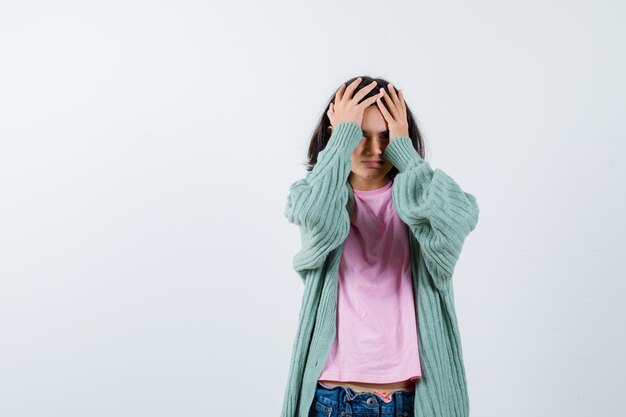 Expressive young girl posing in the studio