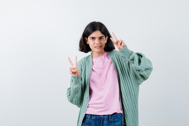 Expressive young girl posing in the studio