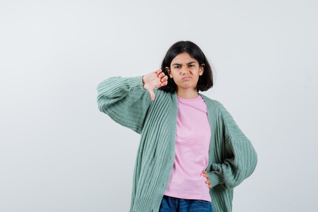 Expressive young girl posing in the studio