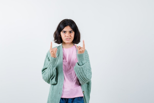 Expressive young girl posing in the studio