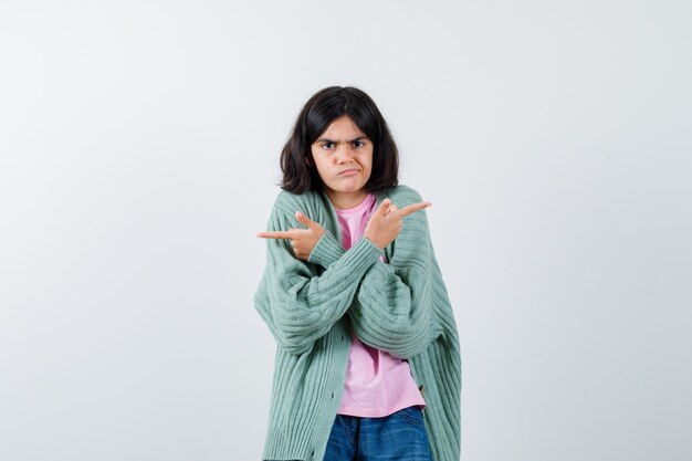 Expressive young girl posing in the studio