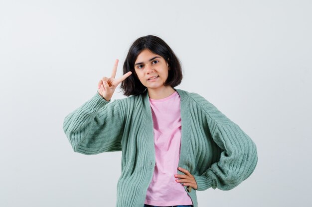 Expressive young girl posing in the studio