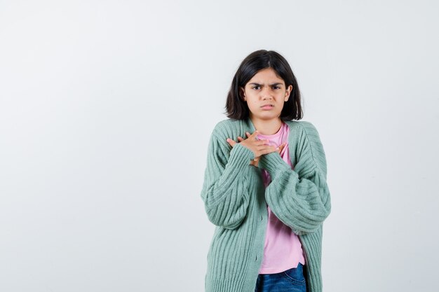 Expressive young girl posing in the studio