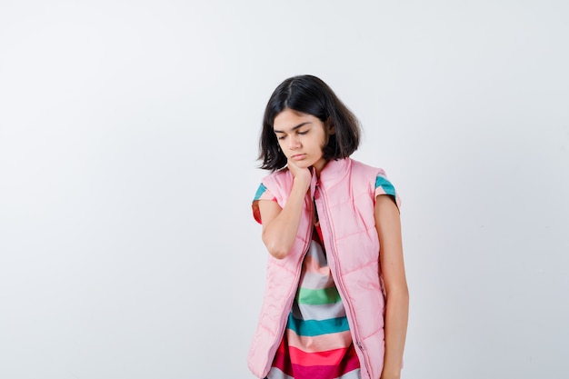 Expressive young girl posing in the studio