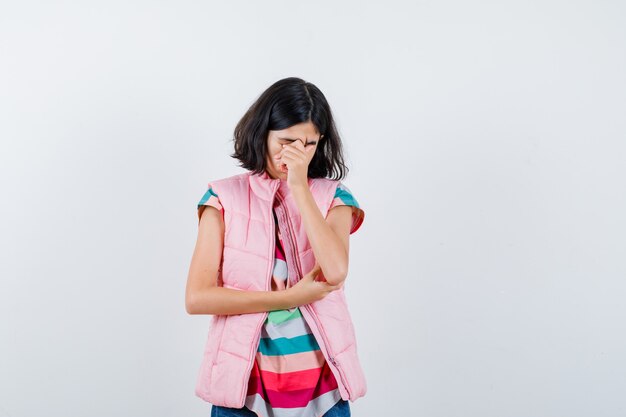 Expressive young girl posing in the studio