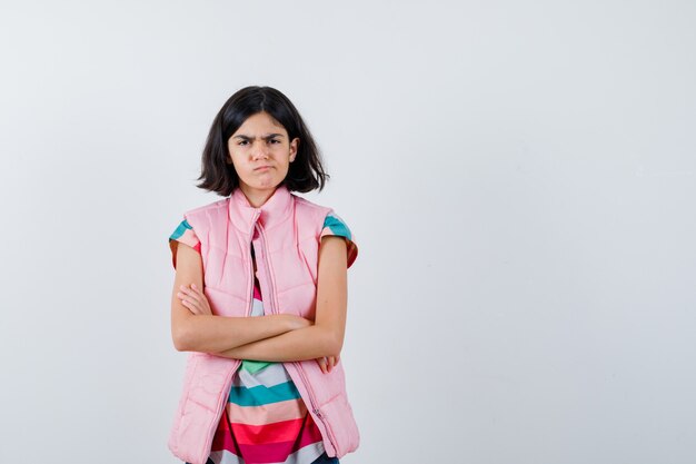 Expressive young girl posing in the studio