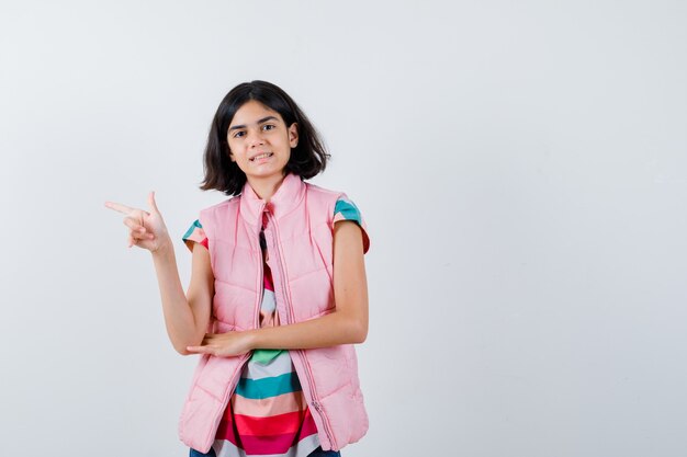 Expressive young girl posing in the studio