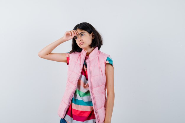 Expressive young girl posing in the studio