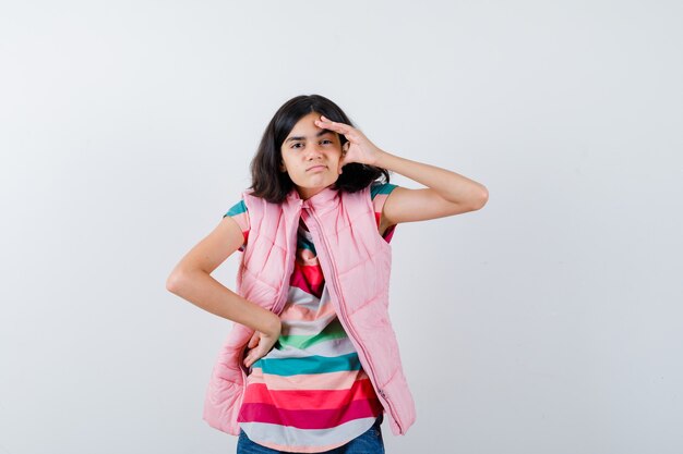 Expressive young girl posing in the studio