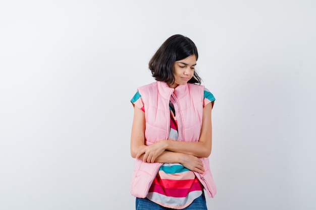 Expressive young girl posing in the studio