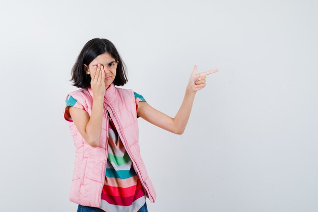 Expressive young girl posing in the studio