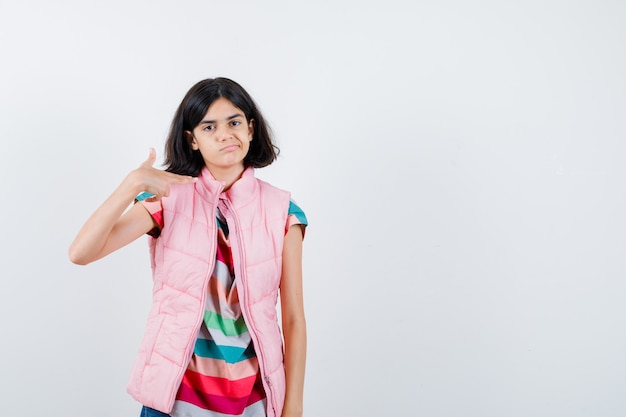 Expressive young girl posing in the studio