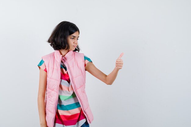 Expressive young girl posing in the studio