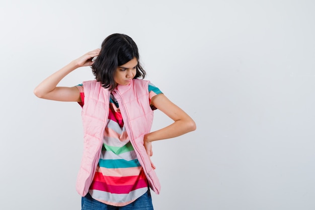 Expressive young girl posing in the studio