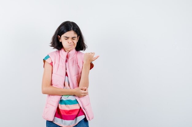 Expressive young girl posing in the studio