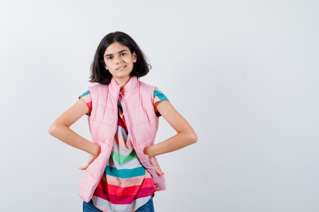 Expressive young girl posing in the studio