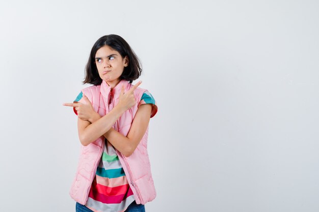 Expressive young girl posing in the studio