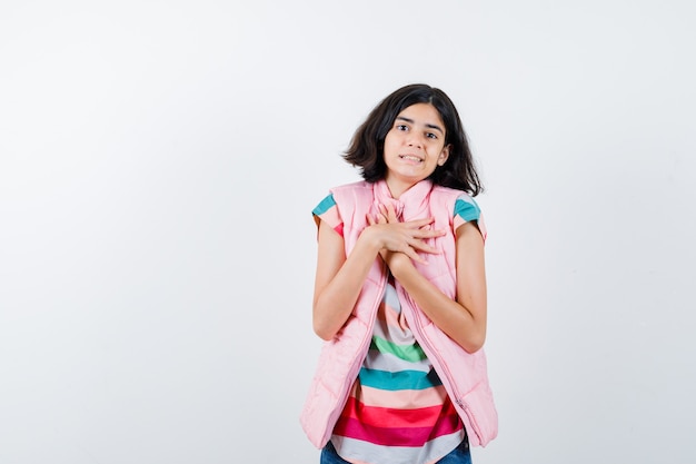 Expressive young girl posing in the studio