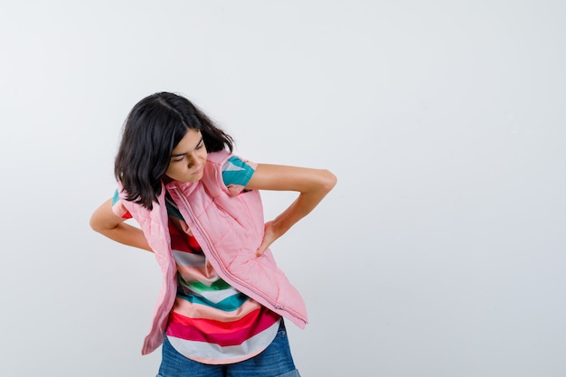 Expressive young girl posing in the studio