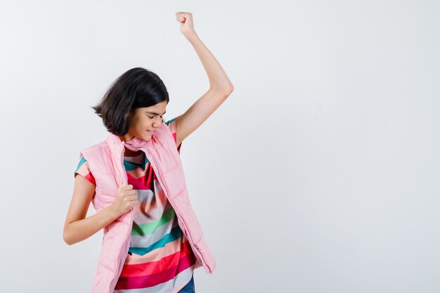 Expressive young girl posing in the studio