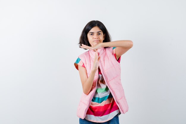 Expressive young girl posing in the studio