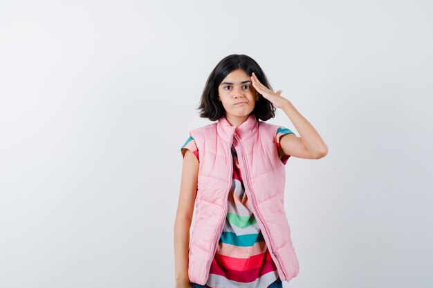 Expressive young girl posing in the studio