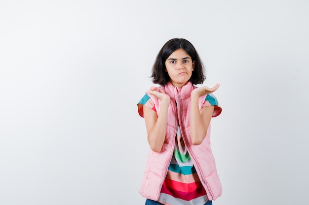 Expressive young girl posing in the studio