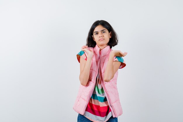 Expressive young girl posing in the studio