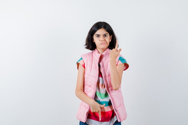 Expressive young girl posing in the studio