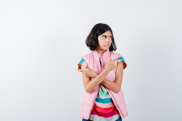 Expressive young girl posing in the studio