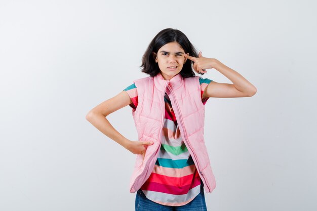 Expressive young girl posing in the studio