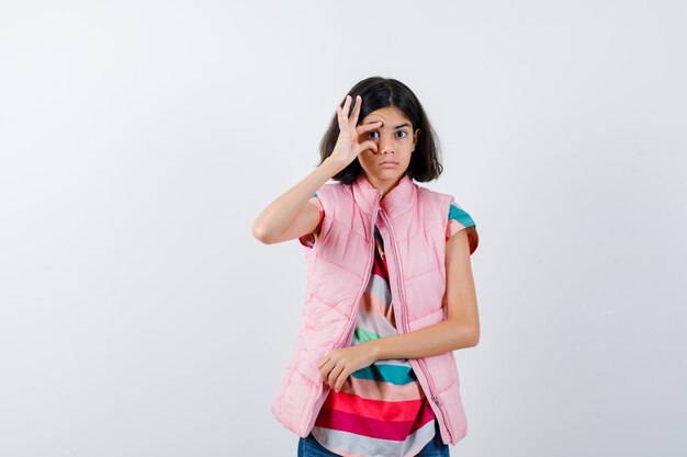 Expressive young girl posing in the studio