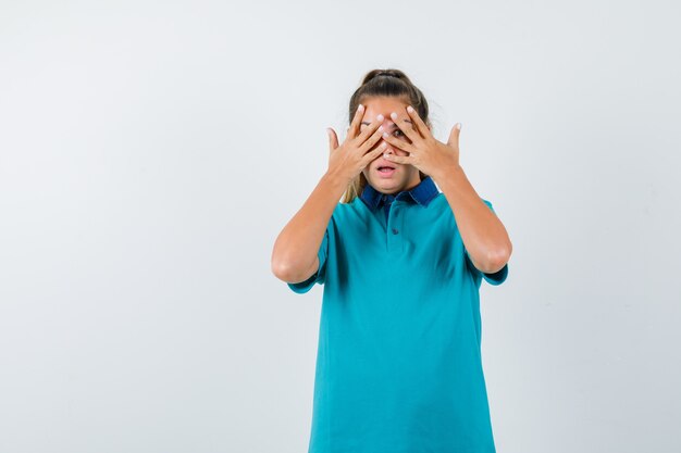 Expressive young girl posing in the studio