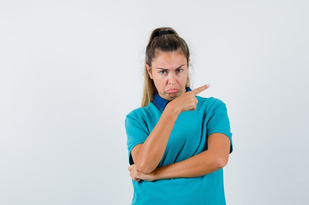 Expressive young girl posing in the studio