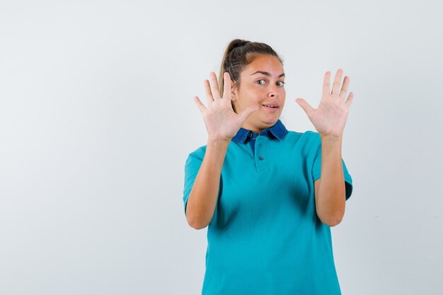 Expressive young girl posing in the studio