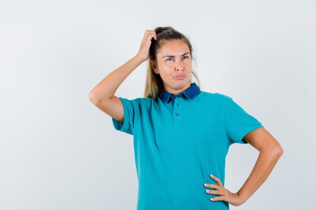 Expressive young girl posing in the studio