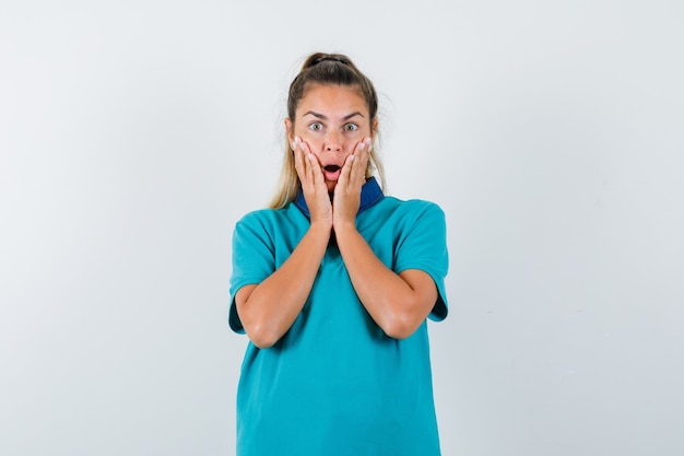 Expressive young girl posing in the studio