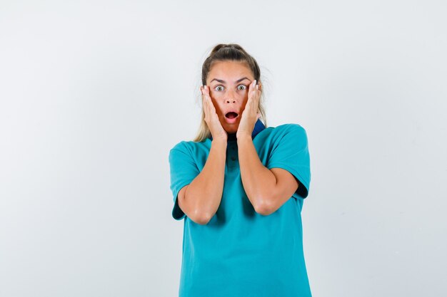 Expressive young girl posing in the studio