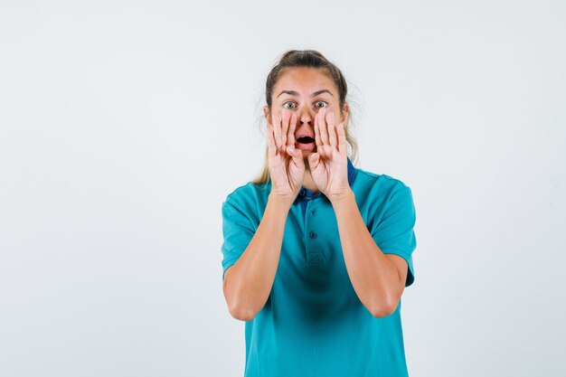 Expressive young girl posing in the studio